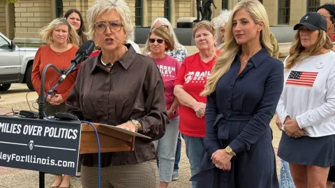 Cindy Bailey, left, wife of Republican governor candidate Darren Bailey, speaks at a news conference outside the Illinois Capitol alongside conservative activist Kristina McCloy on Tuesday, Oct. 27, 2026.