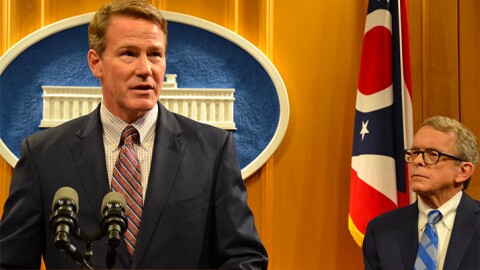 Lt. Gov.-elect Jon Husted speaks with Gov.-elect Mike DeWine looking on.