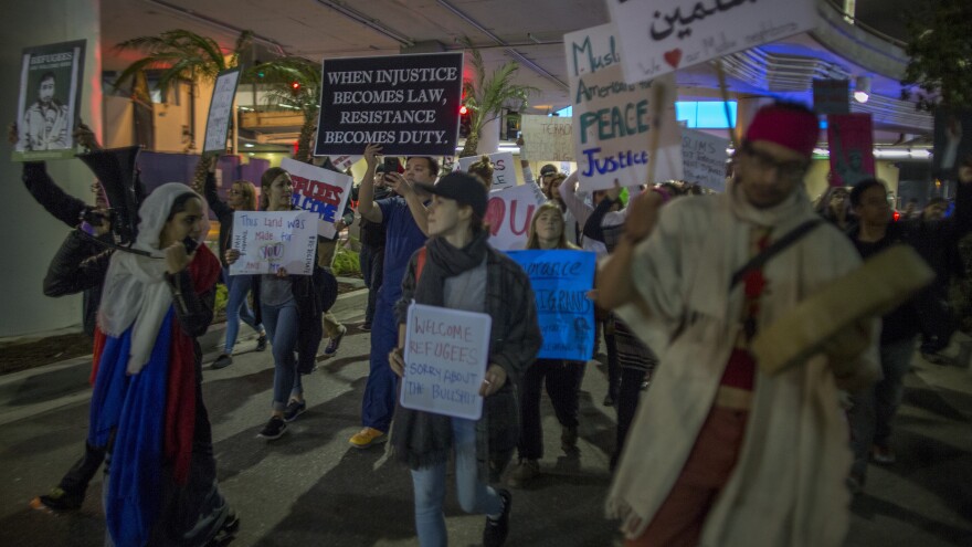 Demonstrators in Los Angeles march to support a federal judge's ruling that grants a nationwide temporary restraining order against President Trump's order to ban travel to the U.S. from seven Muslim-majority countries.