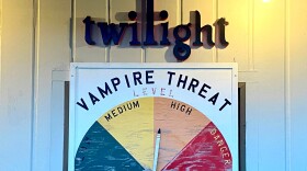 Posted on the side of a convenience store, warning visitors that the threat of vampires is high