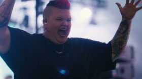 Amber Galloway (pictured above) is a star American Sign Language interpreter who specializes in live music interpretations.