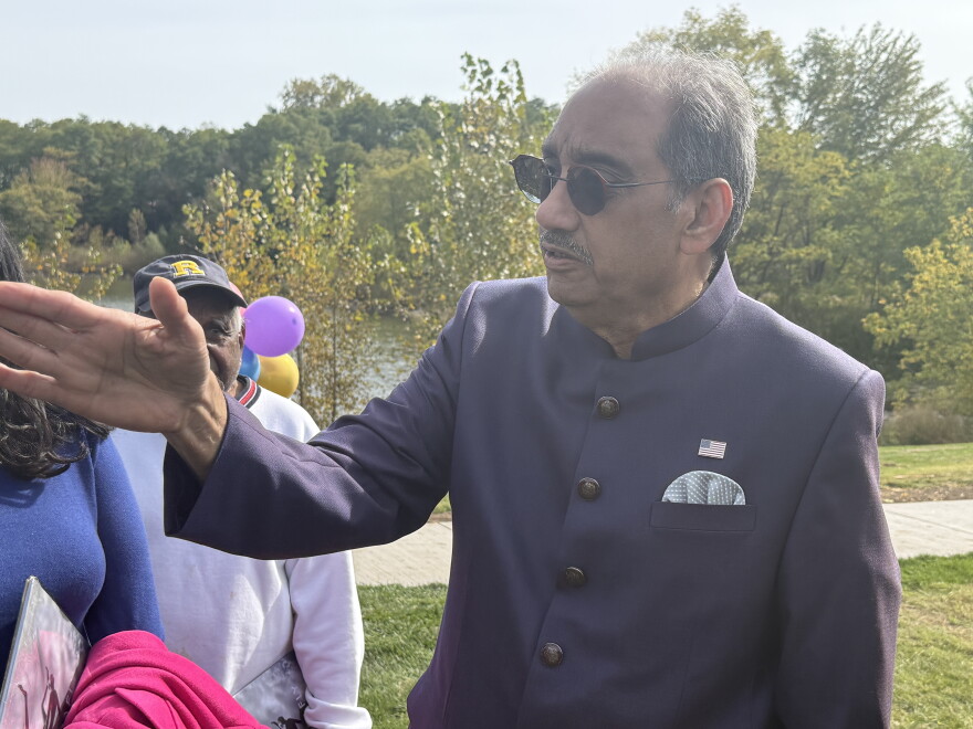 Dr. Vikram Dogra, the founder of the foundation that donated Terrafly to the town of Pittsford, talks at the sculpture's unveiling on Saturday, Oct. 10, 2026.