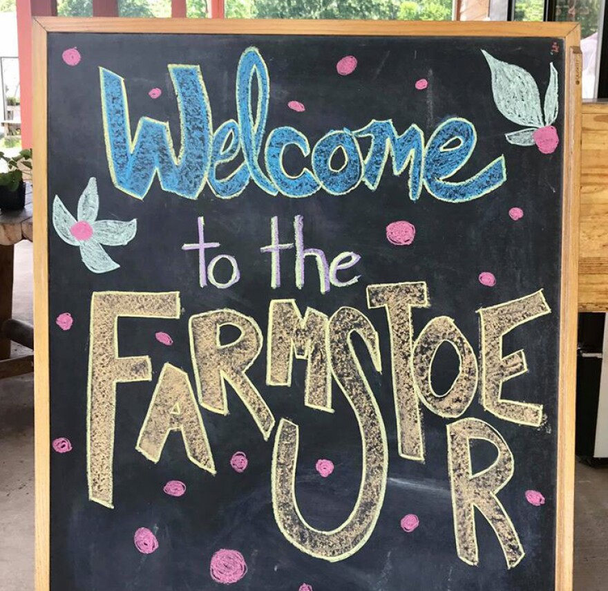 "Welcome to the Farmstore" sign