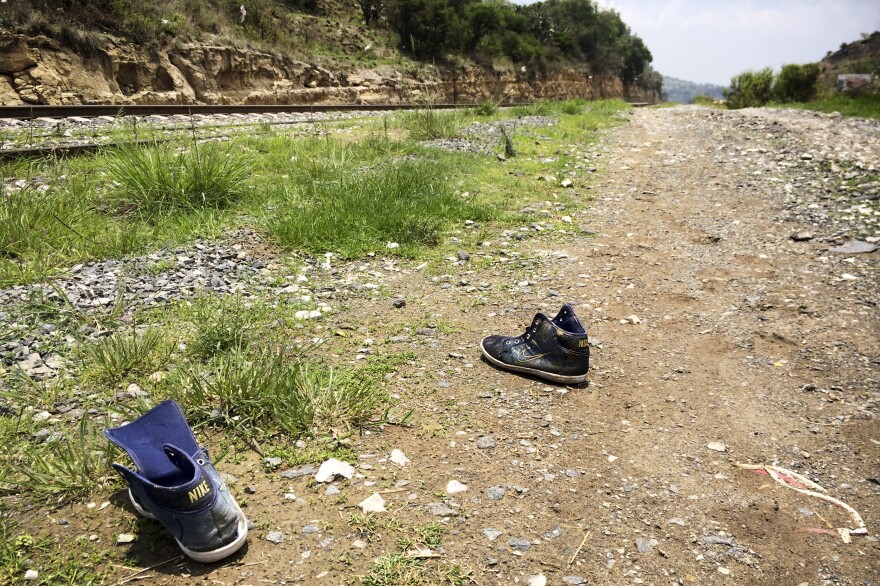 Strewn shoes are commonly found along the tracks outside Huehuetoca. As migrants run alongside the moving trains, they often lose their shoes in the scramble to climb aboard.