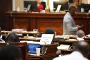 A sign sits on the desk of Democratic South Carolina Rep. Annie McDaniel during the House redistricting debate on Tuesday, May 19, 2026, in Columbia, S.C. (AP Photo/Jeffrey Collins)