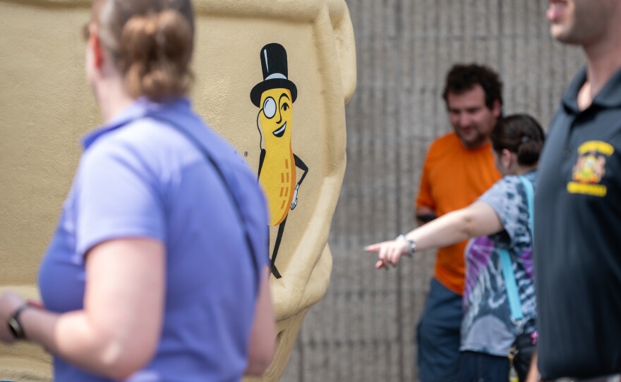 Mr. Peanut is seen painted on the side of the NUTmobile as guests wait to see the inside.