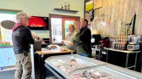 Lamont and Jennifer Herman take care of a customer at Montana Prime Meats in Billings