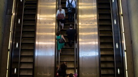 People ride an escalator to exit the Metro transit system in Washington, D.C. (Brendan Smialowski/AFP/Getty Images)