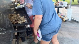  Shawnda Palmer (in blue) lost part of her roof during Hurricane Idalia. She says the storm was devastating. But, hours after the storm passed, she was standing behind a grill helping to feed her community.