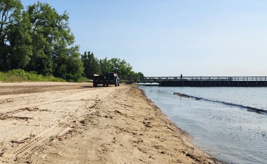 Volunteers clear away after cleaning the shores of Thunder Bay along Blair Street Pier in Alpena on Friday, July 24, 2026.