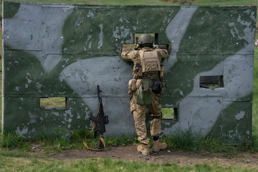 A Ukrainian soldier takes a break during an exercise near Mykolaiv.