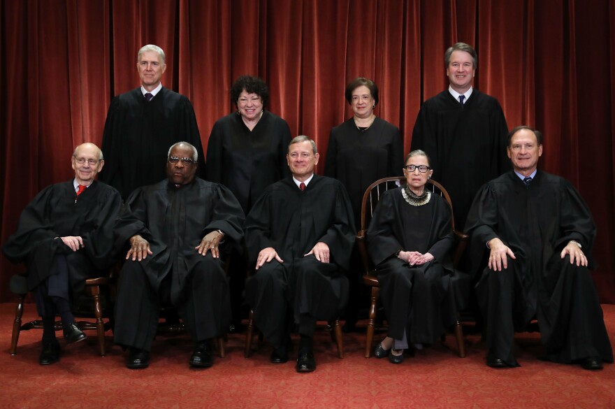 U.S. Supreme Court justices pose for their official portrait in the East Conference Room at the Supreme Court building on Nov. 30, 2018, in Washington, D.C.