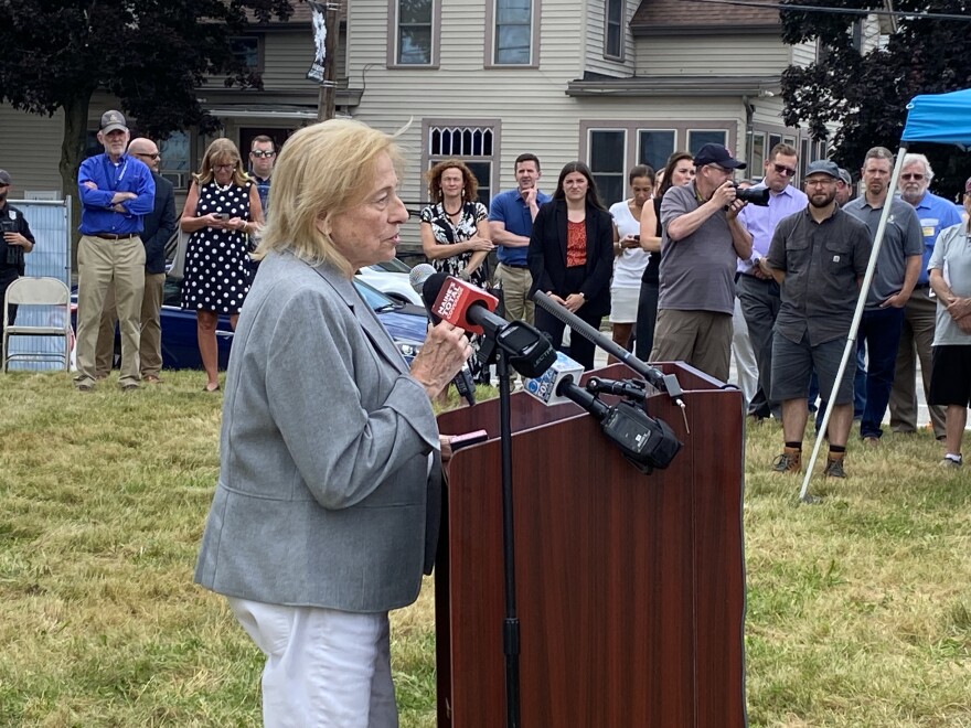 Gov. Janet Mills speaks at a ceremony in Lewiston on  to highlight one of the key initiatives of a plan to fix up neglected housing units and bring economic revitalization to the area. U.S. Sens. Susan Collins and Angus King were on hand for the ceremony, and all heralded the project as the first step in a multi-year effort to revamp the area.