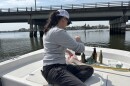 Lisa Renee Jennings with the Chesapeake Bay Foundation disposes of litter collected along the Lafayette River in Norfolk on March 27, 2026.