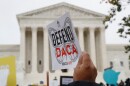 FILE - People rally outside the Supreme Court in support of the Deferred Action for Childhood Arrivals program (DACA), in Washington, Nov. 12, 2019.