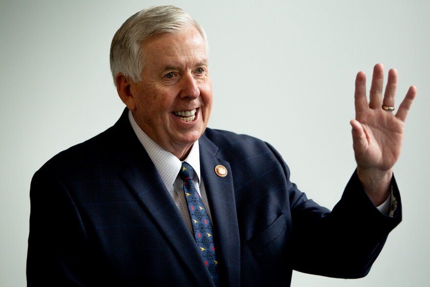 Missouri Gov. Mike Parson waves to the crowd on Tuesday, May 16, 2023, during a press conference at St. Louis Community College in Forest Park.
