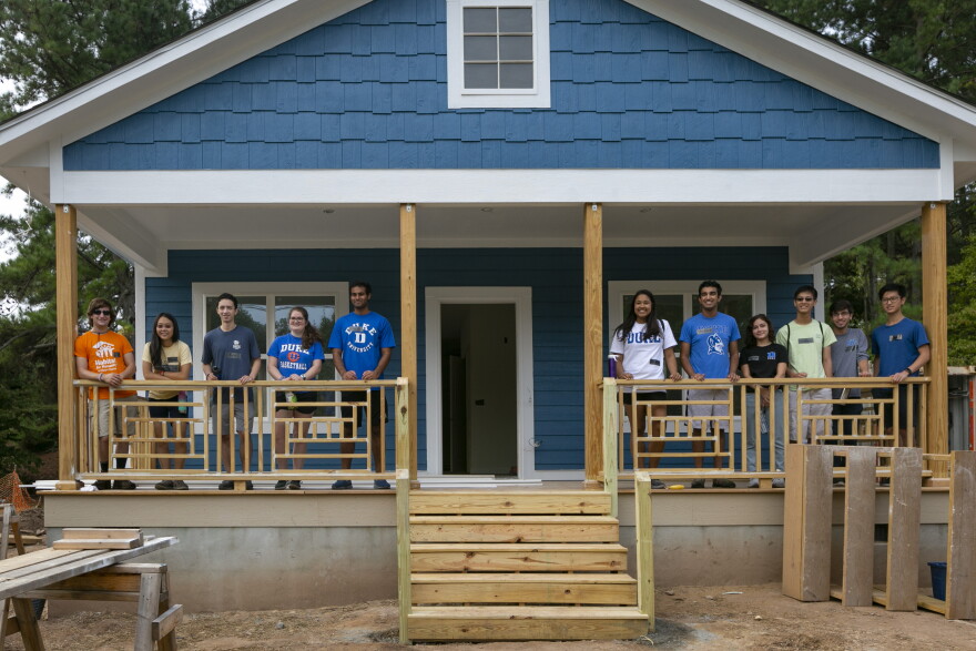 Duke undergraduates volunteer at a Duke Habitat for Humanity build in Durham, NC. The student organization supports Durham Habitat for Humanity through volunteer work and fundraising.