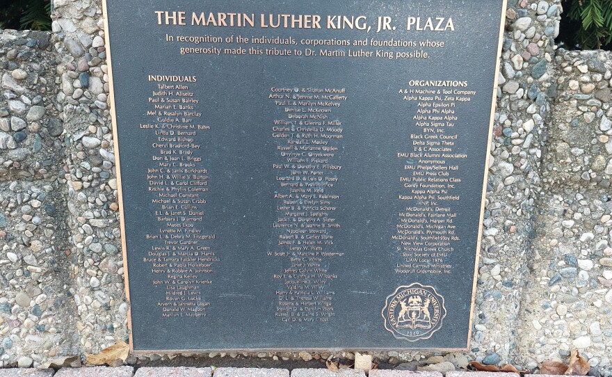 A plaque listing individuals who made EMU's MLK Plaza possible.