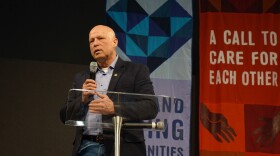 Sen. Michael Crider (R-Greenfield) speaking at New Direction Church during a rally organized by the group Faith In Indiana to urge lawmakers to fully fund Senate Bill 1.