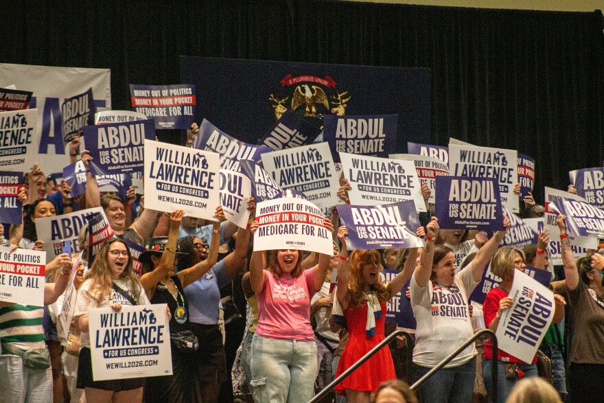 Supporters for U.S. Senate candidate Abdul El-Sayed cheering and waving signs ahead of a rally at the Lansing Convention Center on July 19, 2026.
