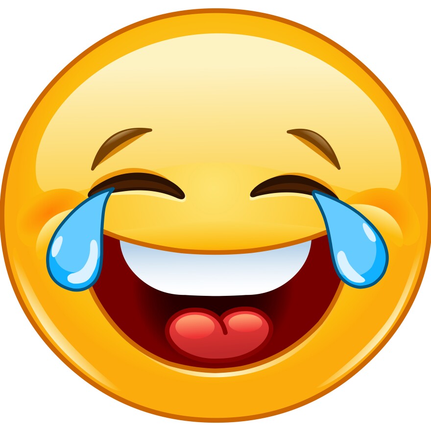 Laughing emoticon with tears of joy.