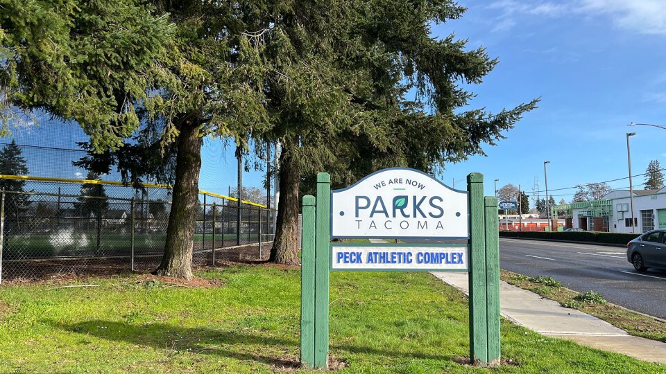 A sign at Peck Athletic Field in Tacoma, operated by Parks Tacoma. The city's parks district is facing a roughly $9 million budget shortfall.