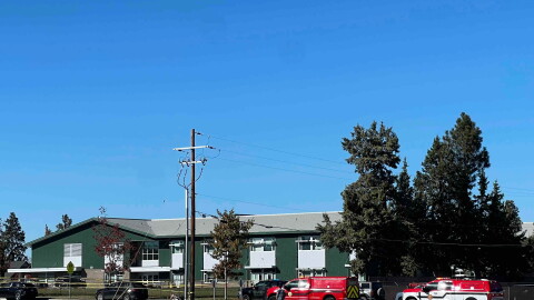 Police tape is placed outside Silver Rail Elementary school, where a shooting took place, on Thursday, Oct. 15, 2026 in Bend, Ore. 