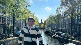 Thomas in front of a river 