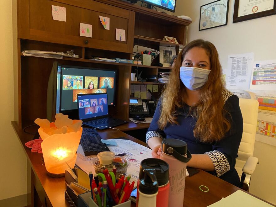 Jamie Shanley at her desk at Little Eagles and Ravens Nest Child Care in Juneau on Feb. 25, 2022.
