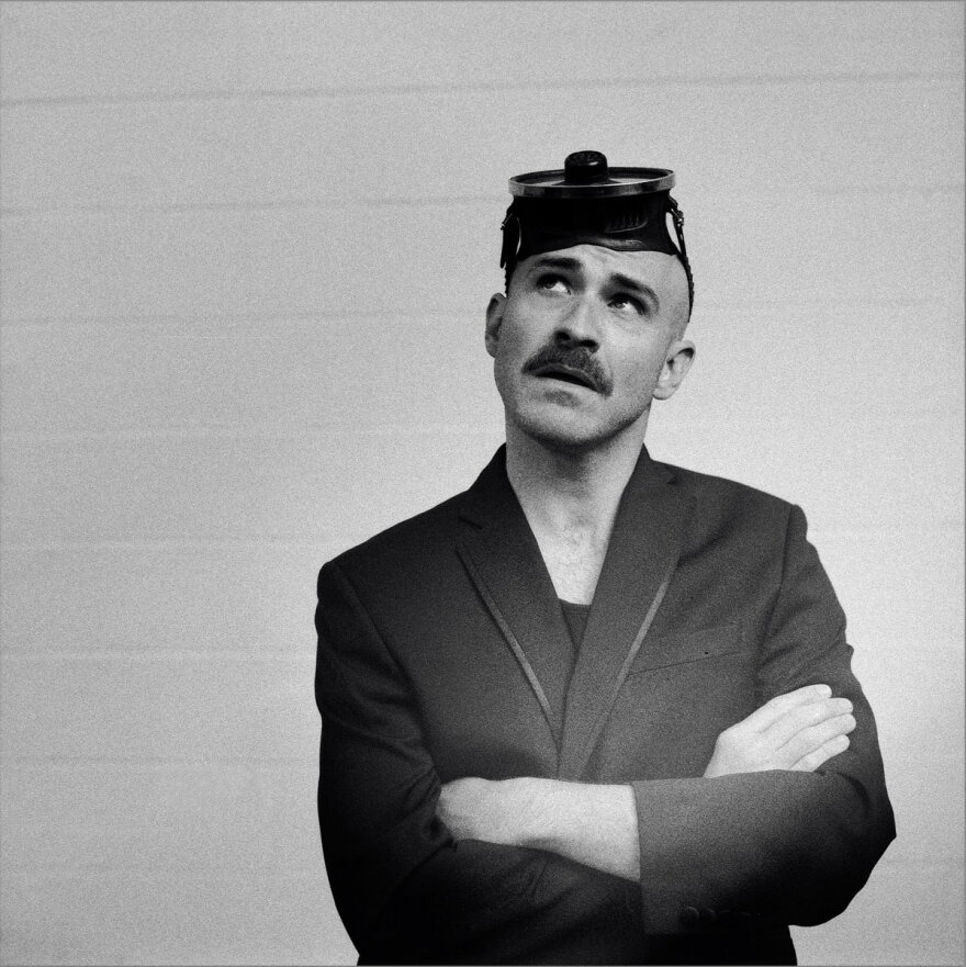 Los Angeles based singer, songwriter Joshua Thomas poses with what looks to be a scuba mask on his head.