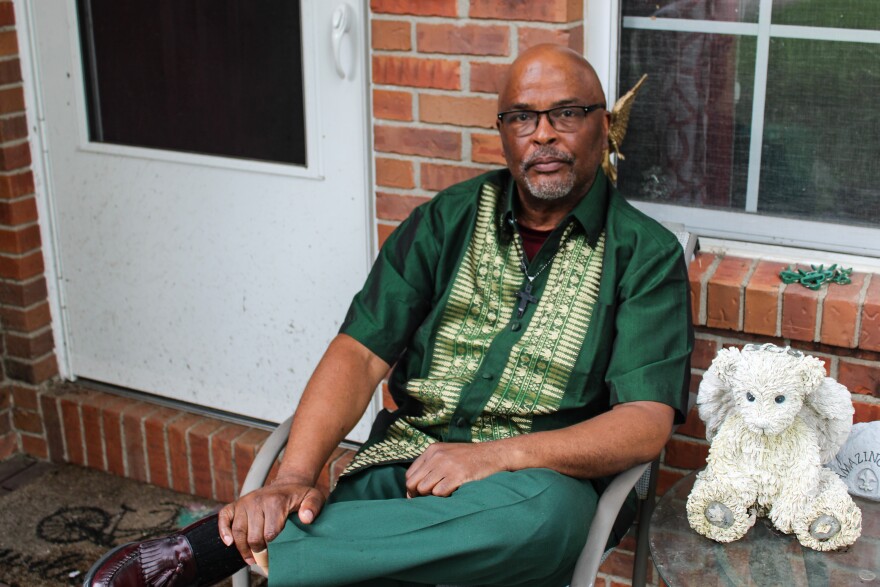 Mark Wiggins, president of the local NAACP branch, poses for a photo outside his Sikeston, Missouri, home. Wiggins grew up in this city that has a history of racial violence. After Lloyd Gilmore died in police custody on June 10, Wiggins protested alongside other residents and civil rights activists in the city. (Cara Anthony/KFF Health News)