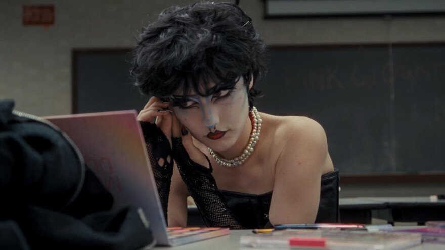 Chloe Rusek, a protagonist and cameraperson for the film, was part of the staff of The Catalyst, the student newspaper when the takeover happened. Here she is dressed as Frank-N-Furter in the New College production of The Rocky Horror Picture Show at the end of her senior year.