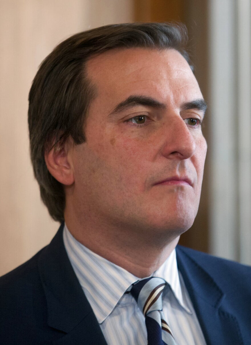 Sen. Michael Gianaris, D-Queens, listens to a speaker during a news conference at the Capitol on Tuesday, Feb. 9, 2016, in Albany, N.Y. (AP Photo/Mike Groll)