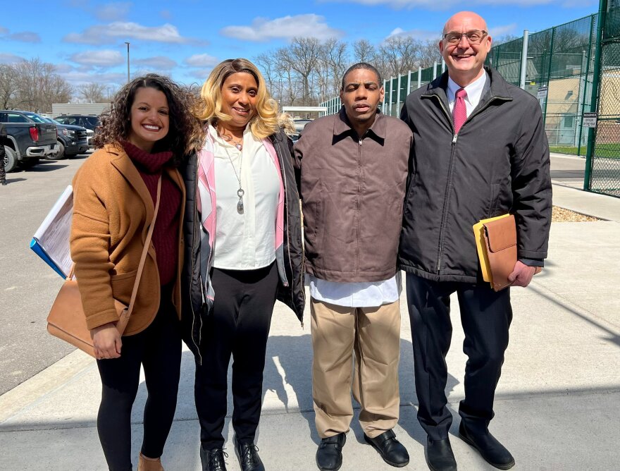 Terance Calhoun (second from right), with members of his defense team from the State Appellate Defender's Office, after his release from prison Wednesday.