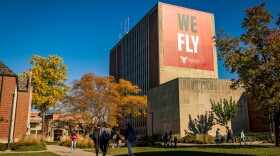 The voluntary early retirement program was only offered to faculty, not staff.