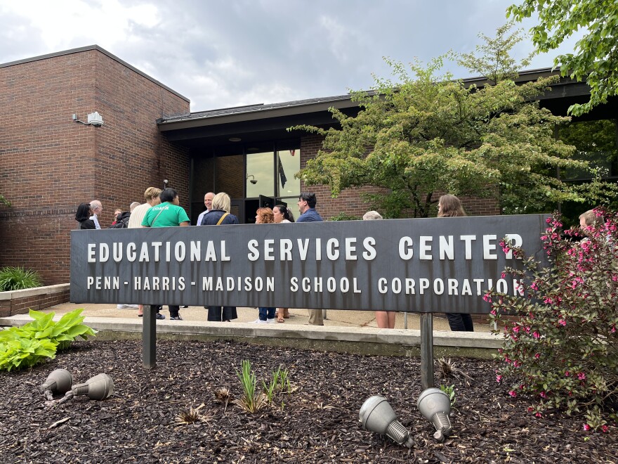 People wait outside the Penn-Harris-Madison administration building before a school board meeting regarding trustee Matt Chaffee on May 14, 2024.