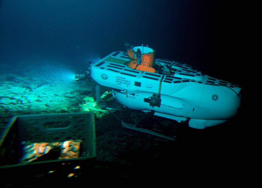 The Pisces IV submersible sits atop the summit of Cook seamount, as seen from the Pisces V craft, during a dive to the previously unexplored underwater volcano off the coast of Hawaiʻi Island on Sept. 6, 2016. 