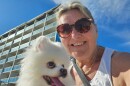 Nanette McKeel Petrella and Mac visit the dog-friendly stretch of beach in Ormond Beach. Petrella, who has three small dogs, leads the Daytona Dog Beach nonprofit.