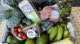 One food box from the Hawaiʻi Food Basket provided to patients at the Hawaiʻi Island Community Health Center. Everything included is locally sourced from nearly 50 farmers across the island.