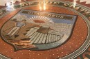 Tiled mosaic of the Arizona state seal on a floor