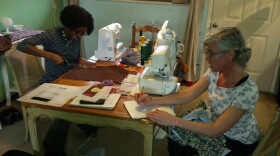 Lawanda Stonerock and Tracy McElfresh work together on their sewing projects