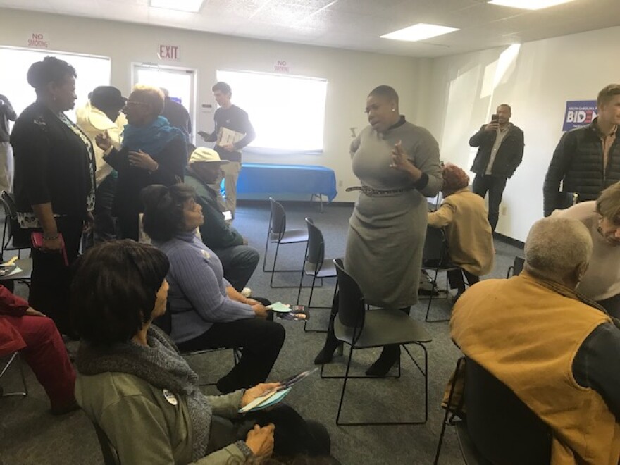 Biden senior advisor Symone Sanders talks with a group of supporters in Bishopville, SC Friday, Feb. 21.