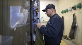 Damaso Garcia stands at his locker during a break on Thursday, March 1, 2018, at Evergreen Washelli Cemetery in Seattle. 