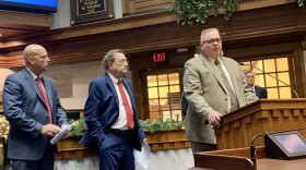 Indiana Fraternal Order of Police President Bill Owensby, right, speaks about proposed legislation alongside Sen. Michael Crider (R-Greenfield), left, and Sen. Mike Young (R-Indianapolis), center.