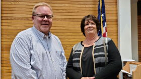 Jeremy Benson is the new McDonough County clerk, replacing Gretchen DeJaynes. The two posed for photos after the Dec. 2, 2024 county board meeting.