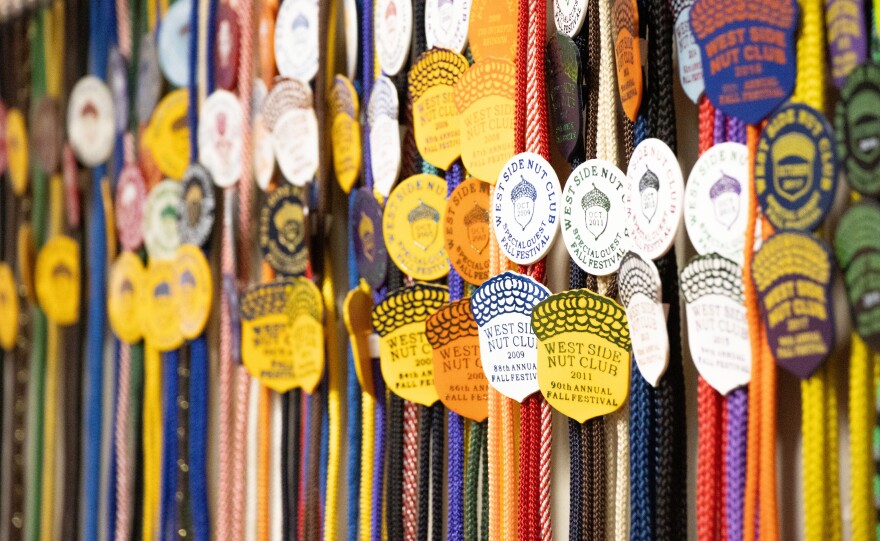 Nut Club members wear these chords on their iconic straw hats. The half pot raffle began in 2019, and has raised more than $9 million so far.