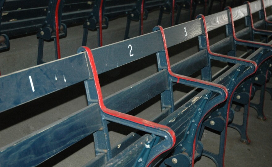 Fenways boasts "the oldest seats in baseball." Owners purposely decided not to sandblast the layers of paint, but rather to let these right field grandstand seats show their history and their age.
