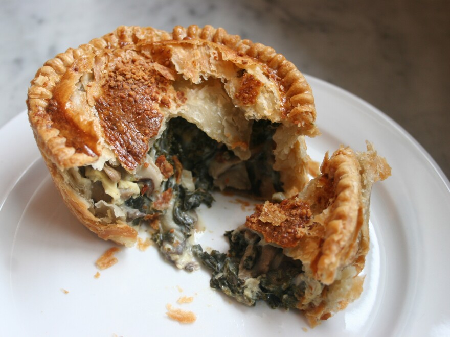 Mushroom And Kale Pie, shown here as a single-serving pie at Pleasant House Bakery.