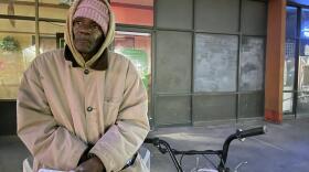 Michael Warner, 61, who says he has been living on the streets for three years, talks about his situation during a one-day count of homeless individuals in Phoenix on Jan. 25, 2022. Warner said he lost his job as a quality control manager, then the home he was renting, after suffering two strokes and now cannot afford a place to live on his disability income. Authorities say the count showed the number of homeless people in Maricopa County, Arizona's largest, surged 35% over two years amid a housing crisis and economic hardship caused by the coronavirus pandemic. A report released by the Maricopa Association of Governments says that 5,029 people in the county, including 3,096 people in Phoenix, experienced homelessness in unsheltered situations the night of Jan. 25.