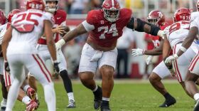 Alabama offensive lineman Kadyn Proctor (74) blocks against Oklahoma during the first half of an NCAA college football game, Saturday, Nov. 15, 2025, in Tuscaloosa, Ala. (AP Photo/Vasha Hunt)
